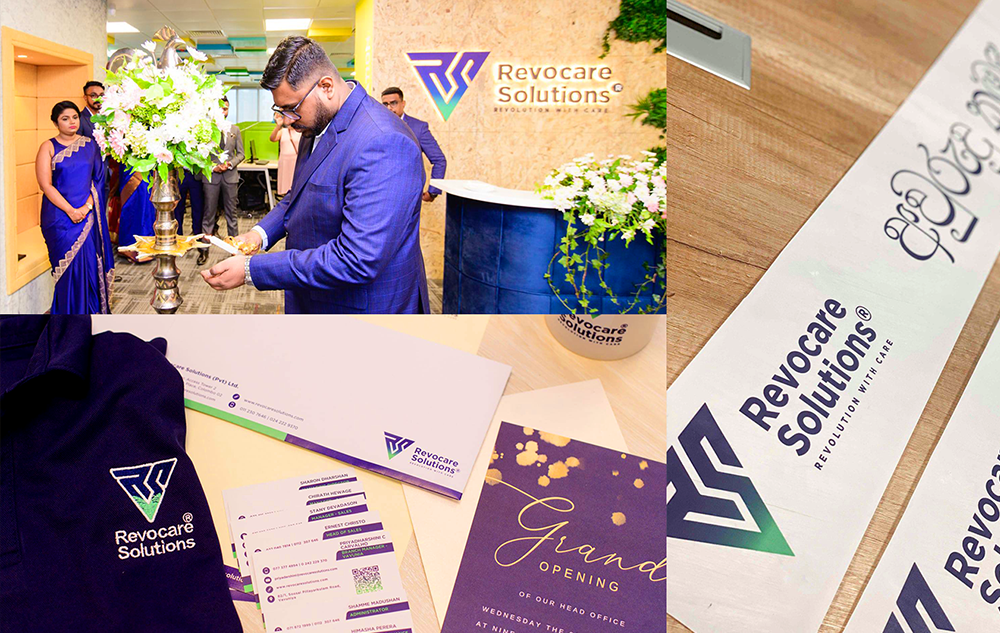 Revocare Solutions BPO company logo design in real use — logo on office wall signage business cards stationery and branded ribbon at grand opening event in Sri Lanka