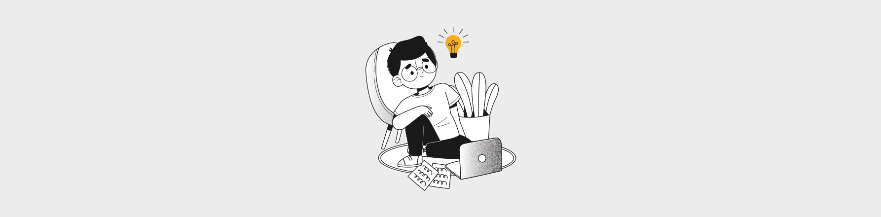 creative designer thinking with laptop and notebooks illustrating graphic design trends for social media 2026